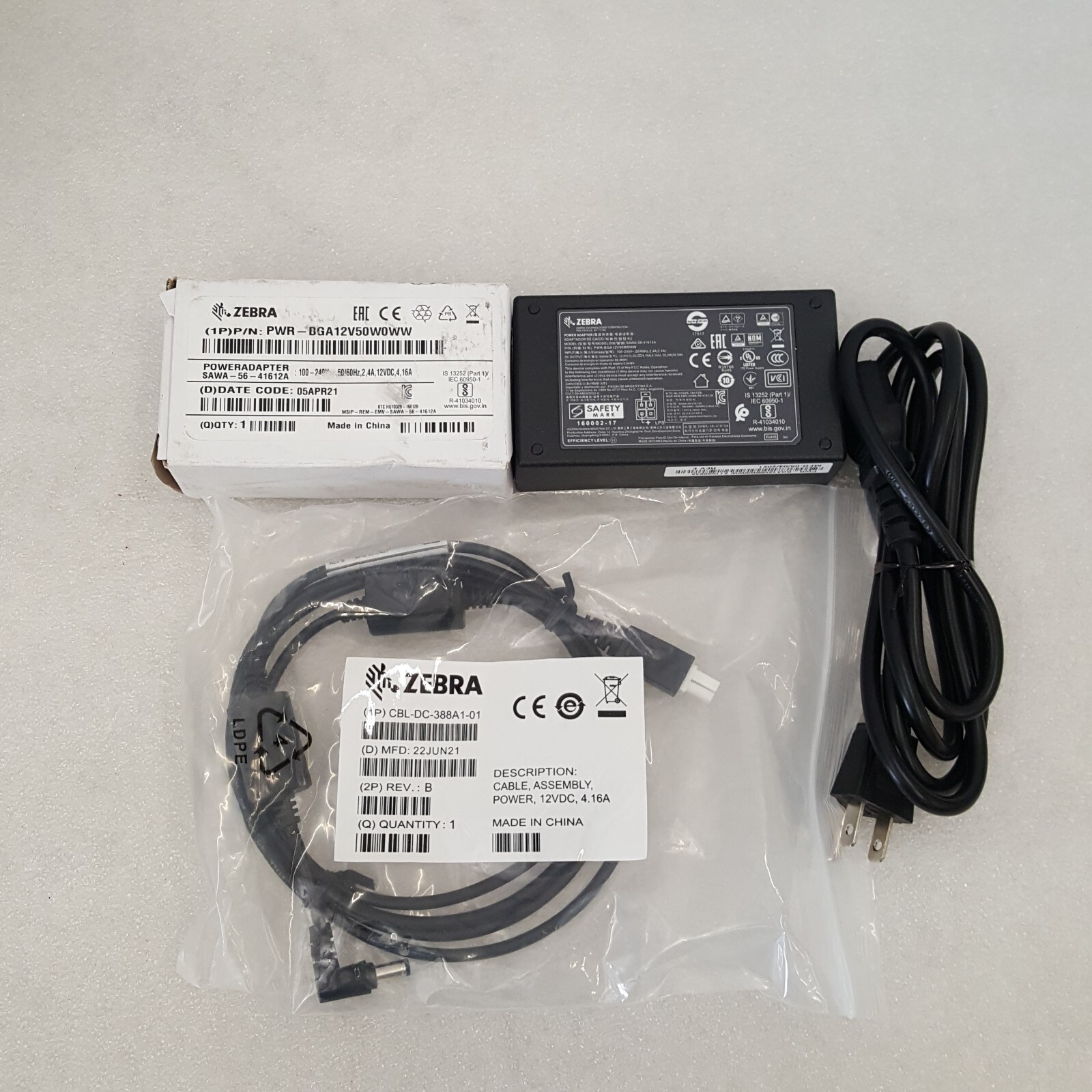 ADAPTADOR DE CORRIENTE ZEBRA PWR-BGA12V50W0WW CON CABLE CBL-DC-388A1-01 CON CABLE DE ALIMENTACIÓN-