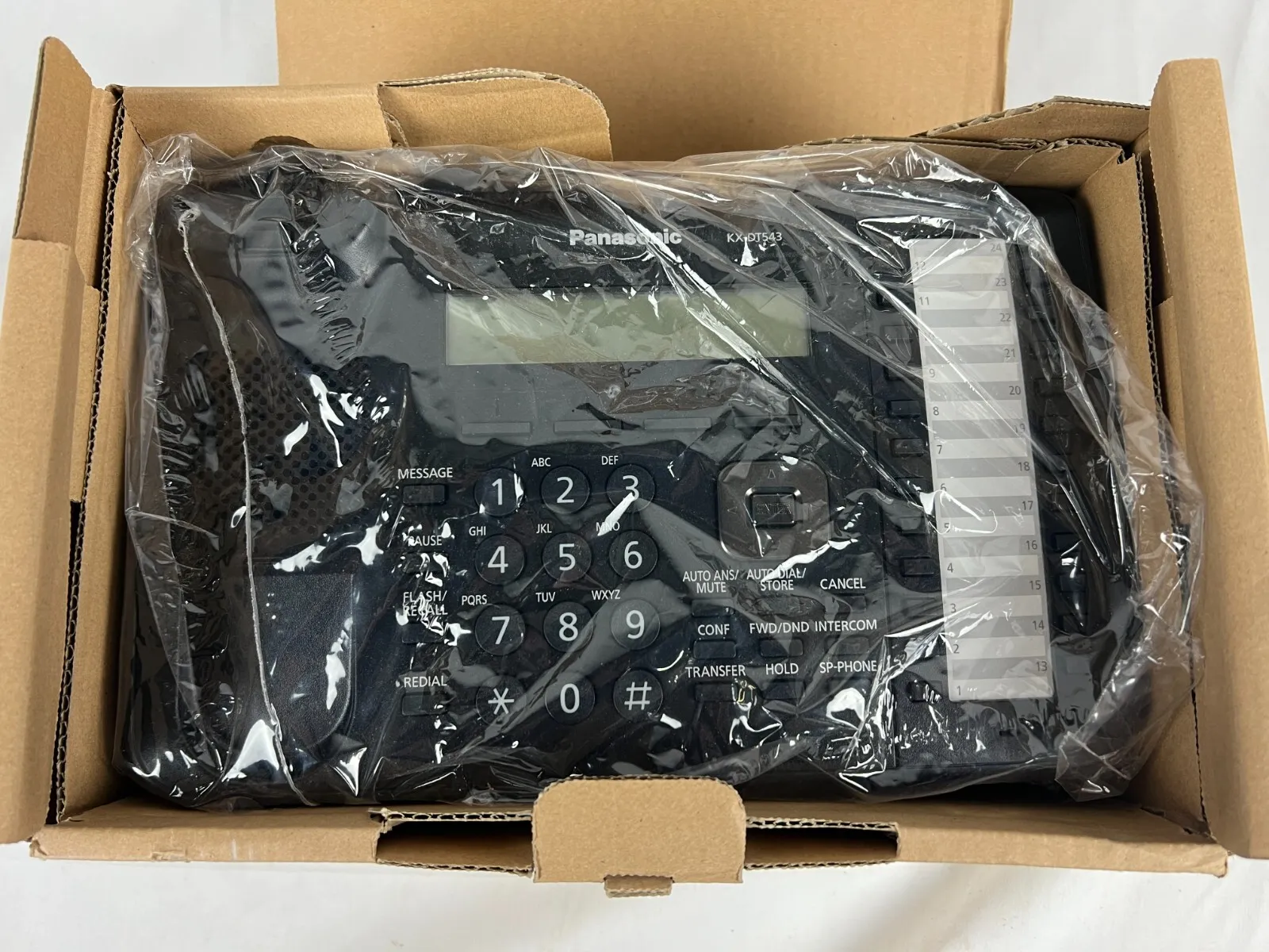 Teléfono digital Panasonic KX-DT543 con 24 botones y LCD retroiluminado de 3 líneas